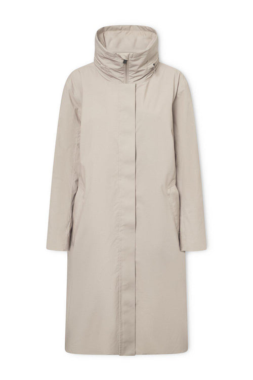 Beige coat on a white background